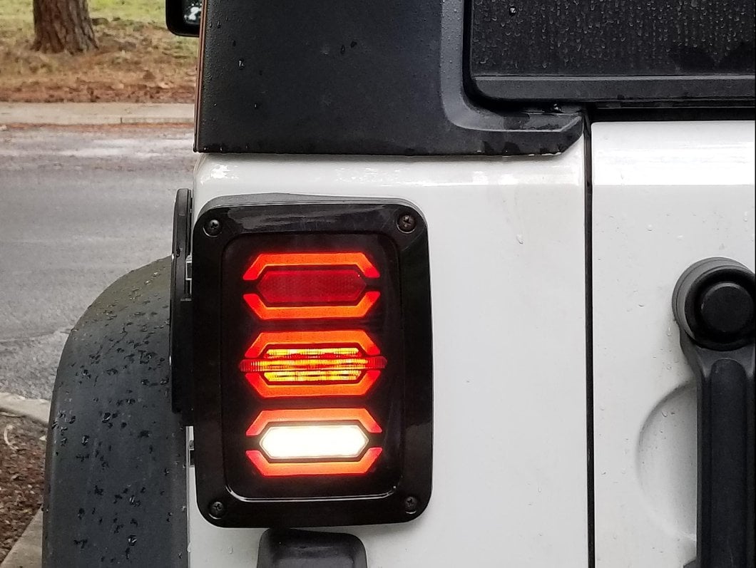 Raxiom LED Tail Lights; Black Housing; Smoked Lens (07-18 Jeep Wrangler JK)