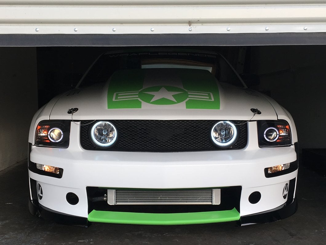 Raxiom 2010 Style LED Halo Headlights; Black Housing; Clear Lens (05-09 Mustang w/ Factory Halogen Headlights, Excluding GT500)