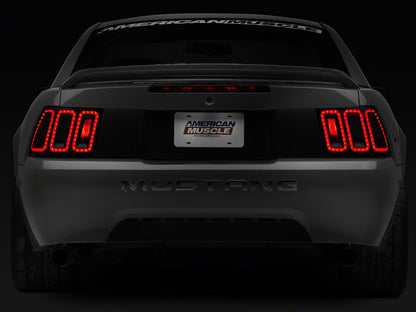 Raxiom Icon LED Tail Lights and Sequential Tail Light Kit; Black Housing; Smoked Lens (99-04 Mustang, Excluding 99-01 Cobra)