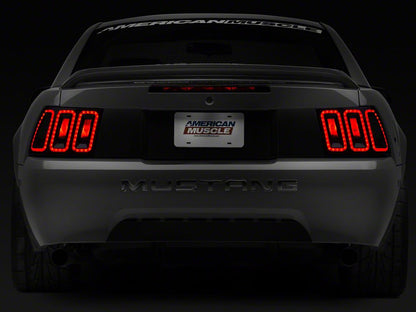 Raxiom Icon LED Tail Lights and Sequential Tail Light Kit; Black Housing; Smoked Lens (99-04 Mustang, Excluding 99-01 Cobra)