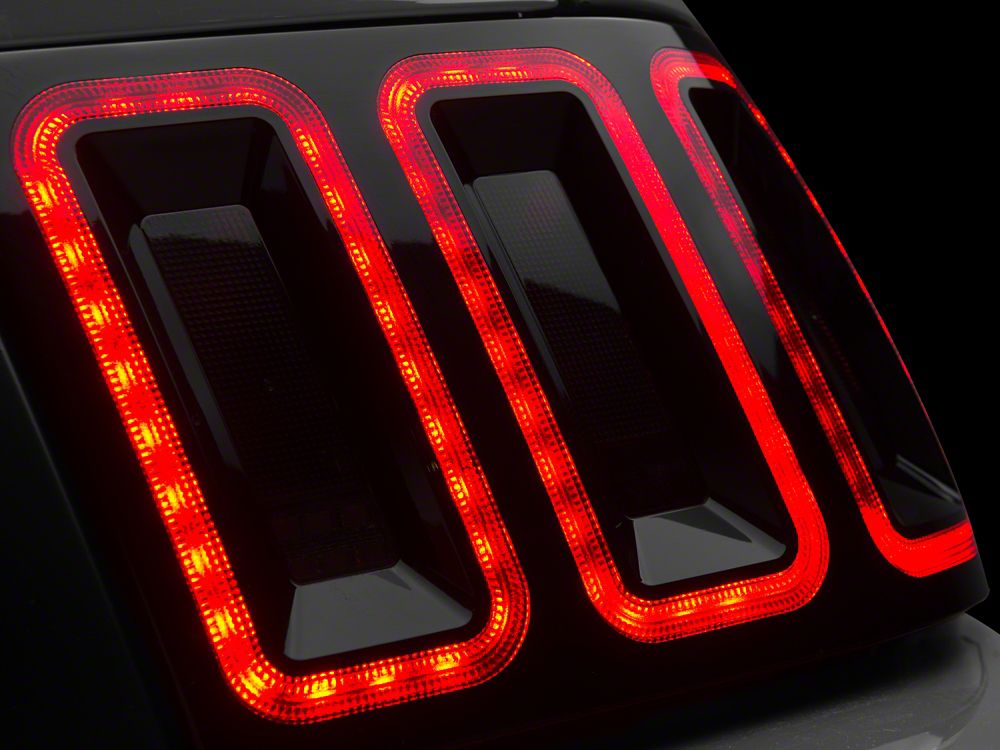 Raxiom Icon LED Tail Lights and Sequential Tail Light Kit; Black Housing; Smoked Lens (99-04 Mustang, Excluding 99-01 Cobra)