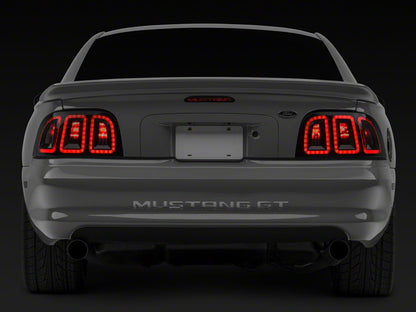 Raxiom Icon LED Tail Lights; Black Housing; Smoked Lens (96-98 Mustang)