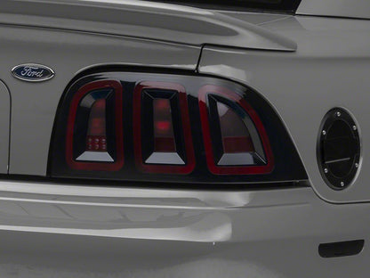 Raxiom Icon LED Tail Lights; Black Housing; Smoked Lens (96-98 Mustang)