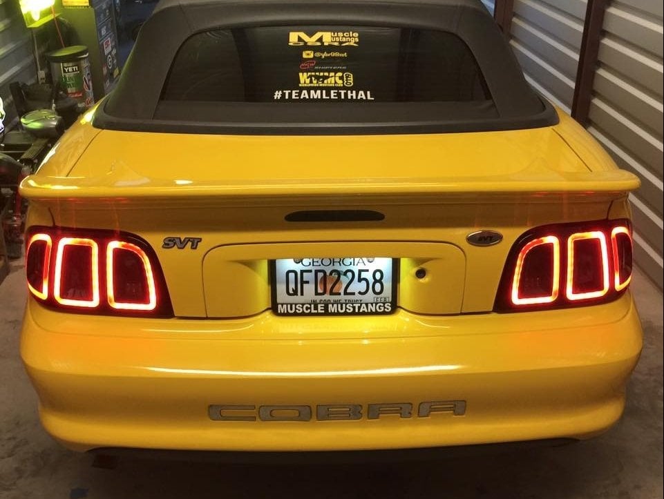 Raxiom Icon LED Tail Lights; Black Housing; Smoked Lens (96-98 Mustang)