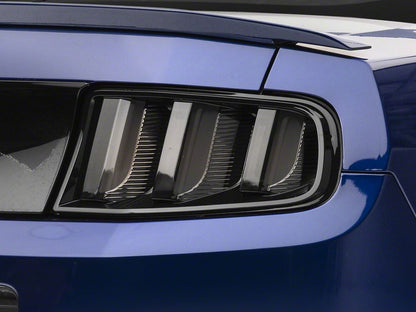 Raxiom Vector V2 Tail Lights; Black Housing; Clear Lens (13-14 Mustang)
