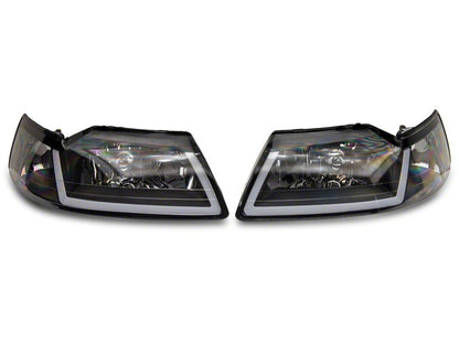 Raxiom Axial Series Headlights with Sequential LED Bar; Black Housing; Clear Lens (99-04 Mustang)