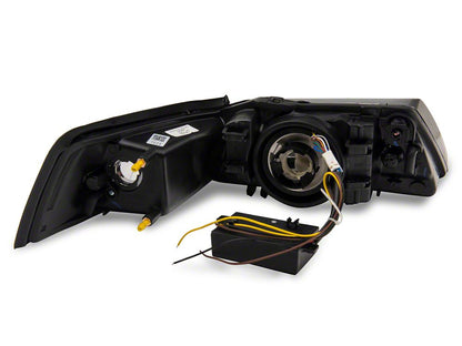 Raxiom Axial Series Headlights with Sequential LED Bar; Black Housing; Clear Lens (99-04 Mustang)