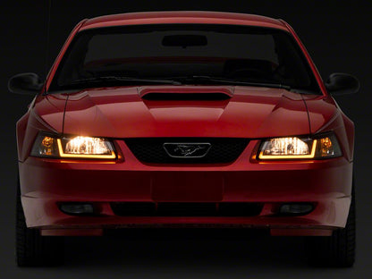 Raxiom Axial Series Headlights with Sequential LED Bar; Black Housing; Clear Lens (99-04 Mustang)