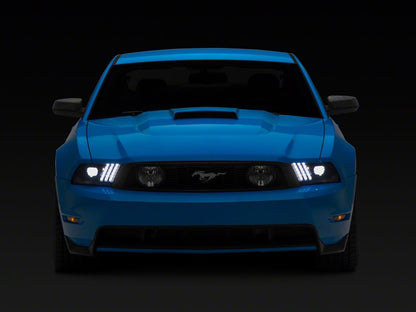 Raxiom LED Projector Headlights with DRL and Sequential Turn Signals; Black Housing; Clear Lens (10-12 Mustang w/ Factory Halogen Headlights)