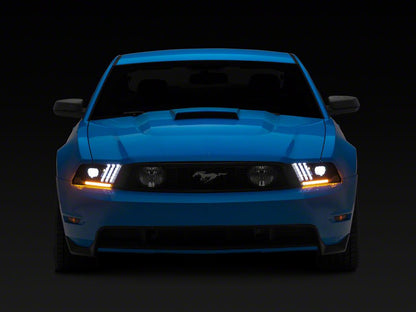 Raxiom LED Projector Headlights with DRL and Sequential Turn Signals; Black Housing; Clear Lens (10-12 Mustang w/ Factory Halogen Headlights)