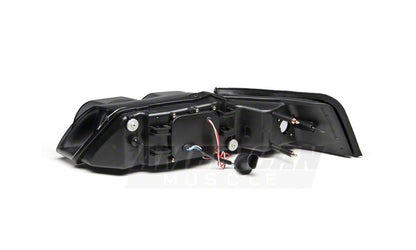 Raxiom Dual LED Halo Projector Headlights; Black Housing; Smoked Lens (99-04 Mustang)
