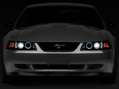 Raxiom Dual LED Halo Projector Headlights; Black Housing; Smoked Lens (99-04 Mustang)