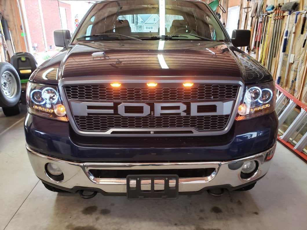 Raxiom Dual LED Halo Projector Headlights; Black Housing; Clear Lens (04-08 F-150)