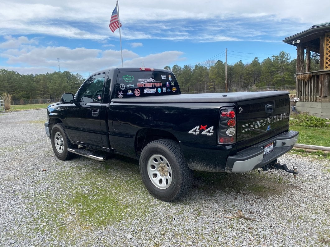 Raxiom Axial Series Tail Lights; Black Housing; Clear Lens (03-06 Silverado 1500 Fleetside)