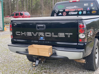 Raxiom Axial Series Tail Lights; Black Housing; Clear Lens (03-06 Silverado 1500 Fleetside)