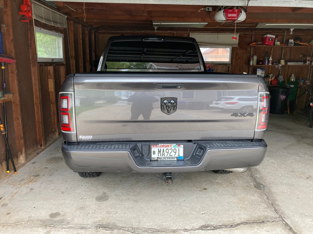 Raxiom LED Tail Lights; Black Housing; Clear Lens (09-18 RAM 1500 w/ Factory Halogen Tail Lights)