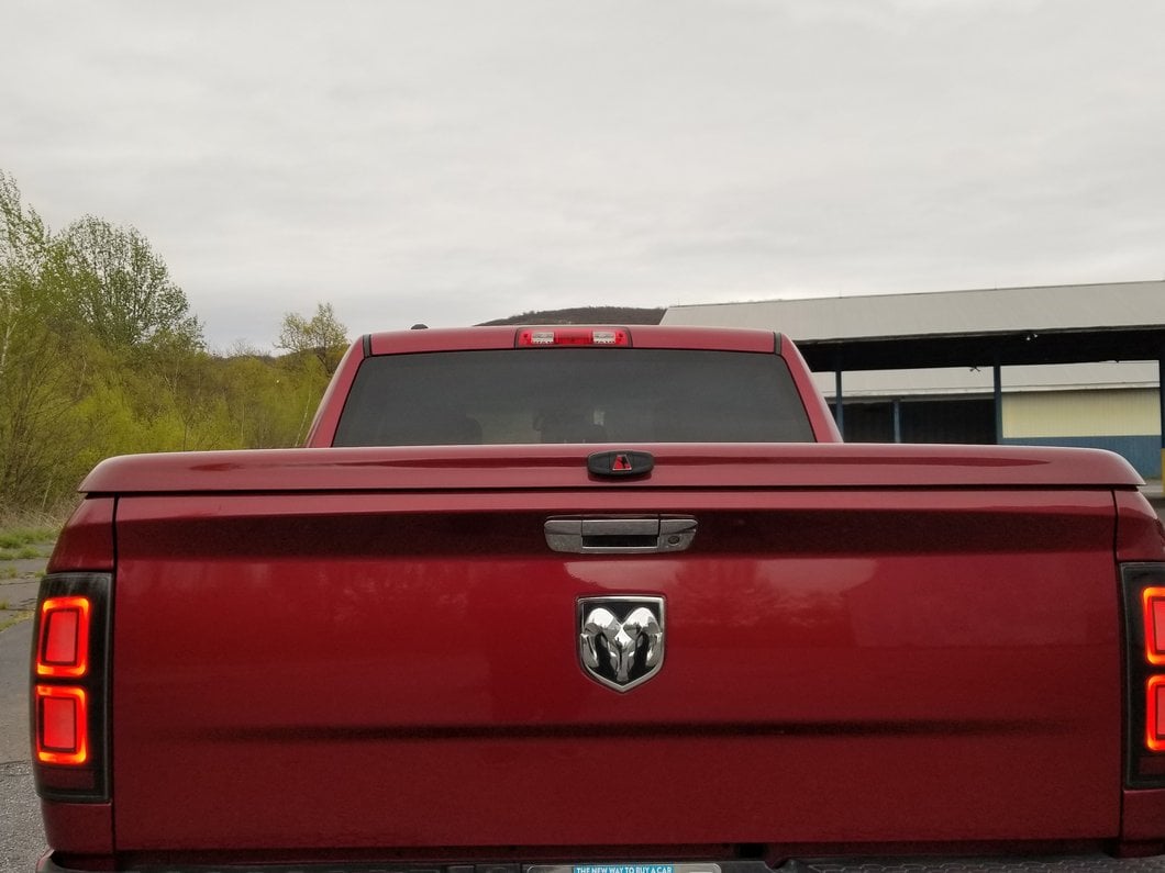 Raxiom LED Tail Lights; Black Housing; Light Smoked Lens (09-18 RAM 1500 w/ Factory Halogen Tail Lights)