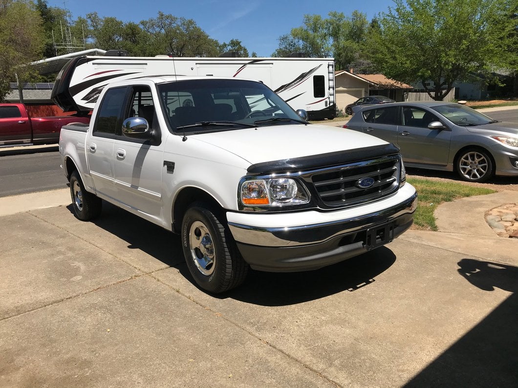 Raxiom G2 Euro Headlights with Parking Lights; Chrome Housing; Clear Lens (97-03 F-150)