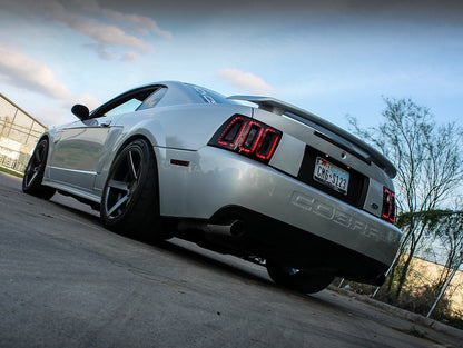 Raxiom Icon LED Tail Lights and Sequential Tail Light Kit; Black Housing; Smoked Lens (99-04 Mustang, Excluding 99-01 Cobra)