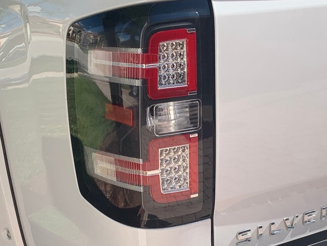 Raxiom LED Tail Lights with Sequential Turn Signals; Chrome Housing; Smoked Lens (14-18 Silverado 1500 w/ Factory Halogen Tail Lights)
