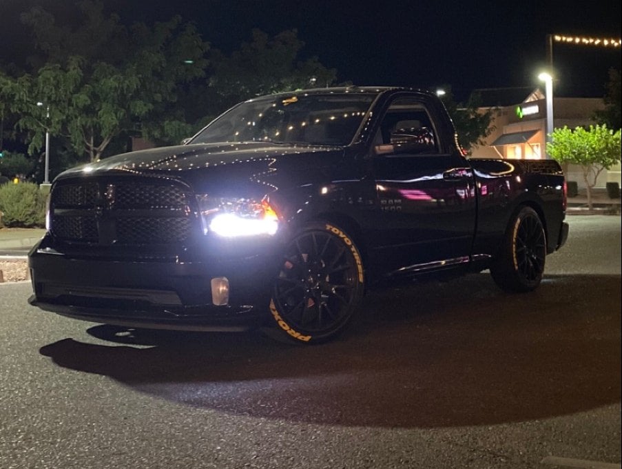 Raxiom LED Halo Headlights with Switchback Turn Signals; Black Housing; Clear Lens (09-18 RAM 1500 w/ Factory Halogen Non-Projector Headlights)