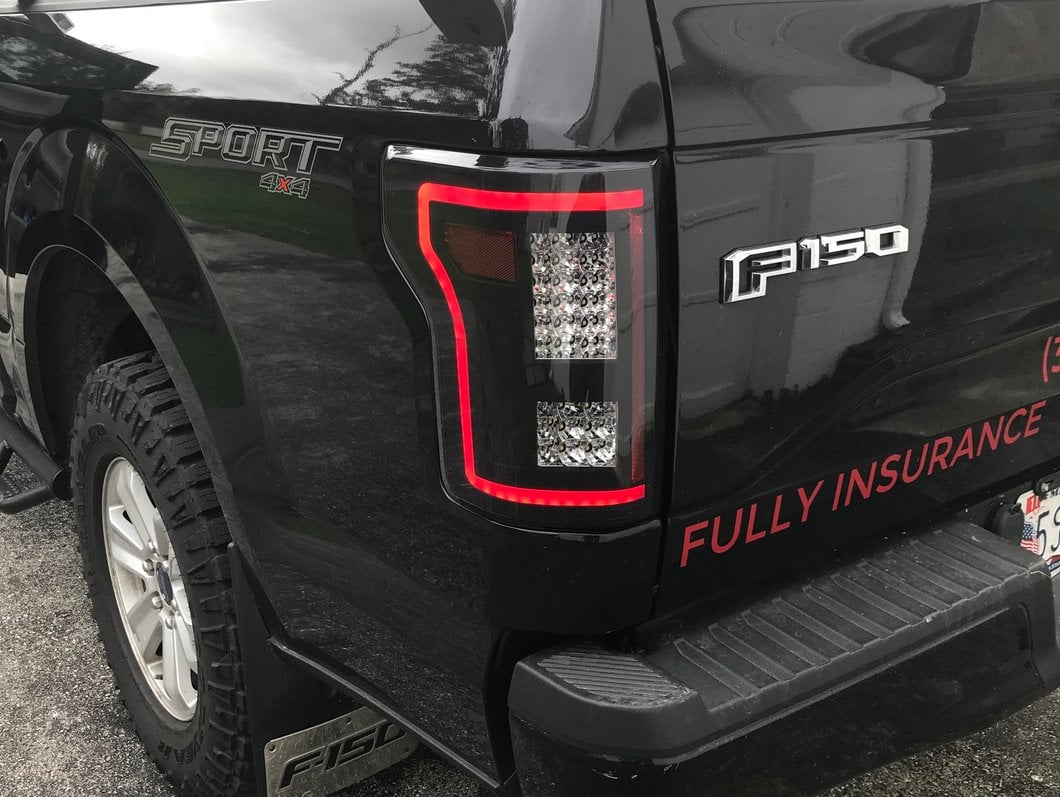 Raxiom LED Tail Lights with Sequential Turn Signals; Black Housing; Smoked Lens (15-17 F-150 w/ Factory Halogen Non-BLIS Tail Lights)