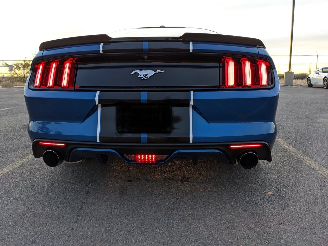 Raxiom Axial Series LED Reverse Light with Running Light and Triple Flash Brake Light; Smoked (15-17 Mustang)