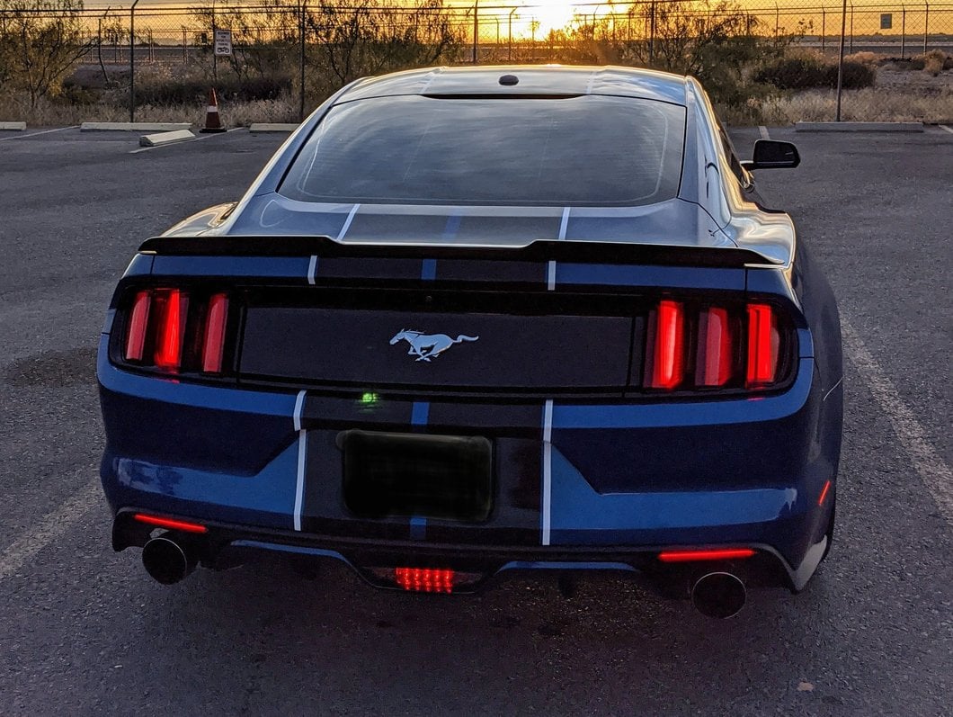 Raxiom Axial Series LED Reverse Light with Running Light and Triple Flash Brake Light; Smoked (15-17 Mustang)