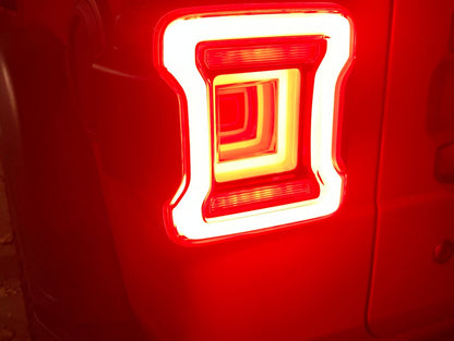 Raxiom Horizon LED Tail Lights; Black Housing; Red Lens (18-25 Jeep Wrangler JL)