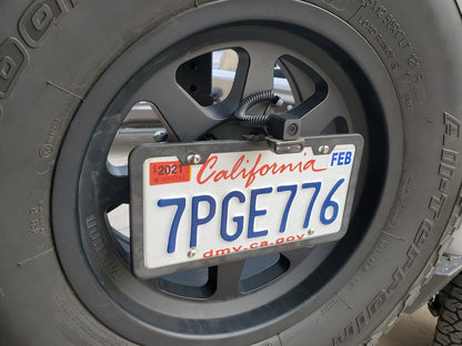 Raxiom Axial Series License Plate Bracket with LED Brake Light (07-18 Jeep Wrangler JK)
