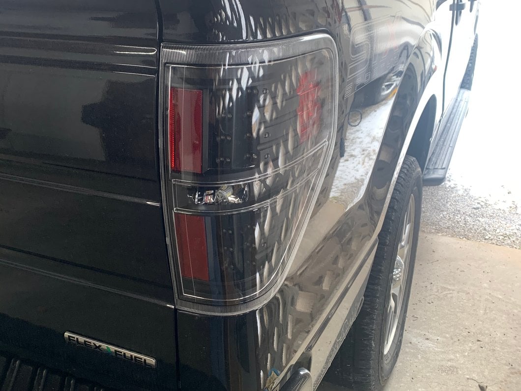 Raxiom LED Tail Lights; Black Housing; Clear Lens (09-14 F-150 Styleside)