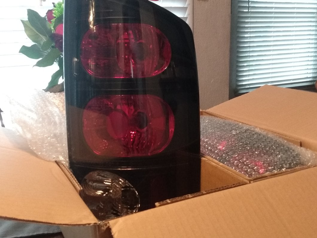 Raxiom Axial Series Tail Lights; Black Housing; Dark Smoked Lens (02-05 RAM 1500)