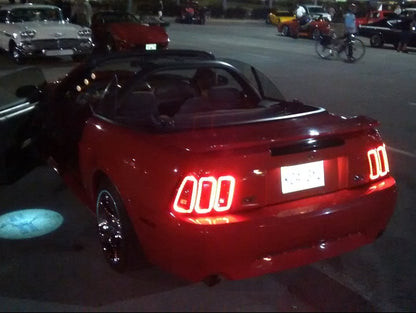 Raxiom Icon LED Tail Lights and Sequential Tail Light Kit; Black Housing; Smoked Lens (99-04 Mustang, Excluding 99-01 Cobra)