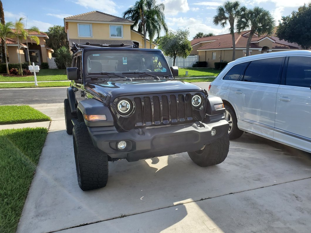 Raxiom Axial Series 7-Inch LED Halo Headlights with DRL, Amber Turn Signals and Headlight Adapter; Black Housing; Clear Lens (18-25 Jeep Wrangler JL)