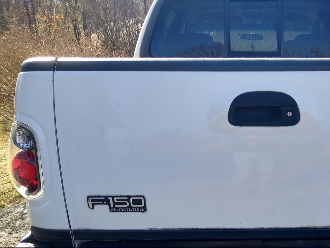 Raxiom Axial Series Version 2 Tail Lights; Black Housing; Clear Lens (01-03 F-150 Flareside)