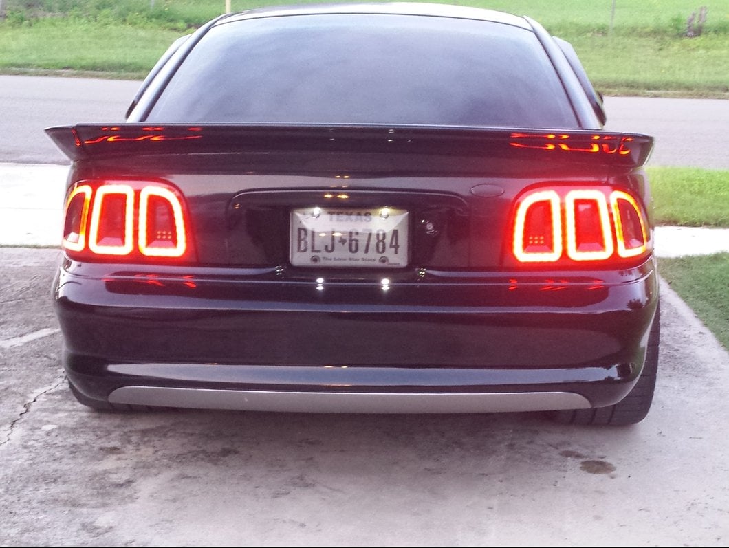 Raxiom Icon LED Tail Lights; Black Housing; Smoked Lens (96-98 Mustang)