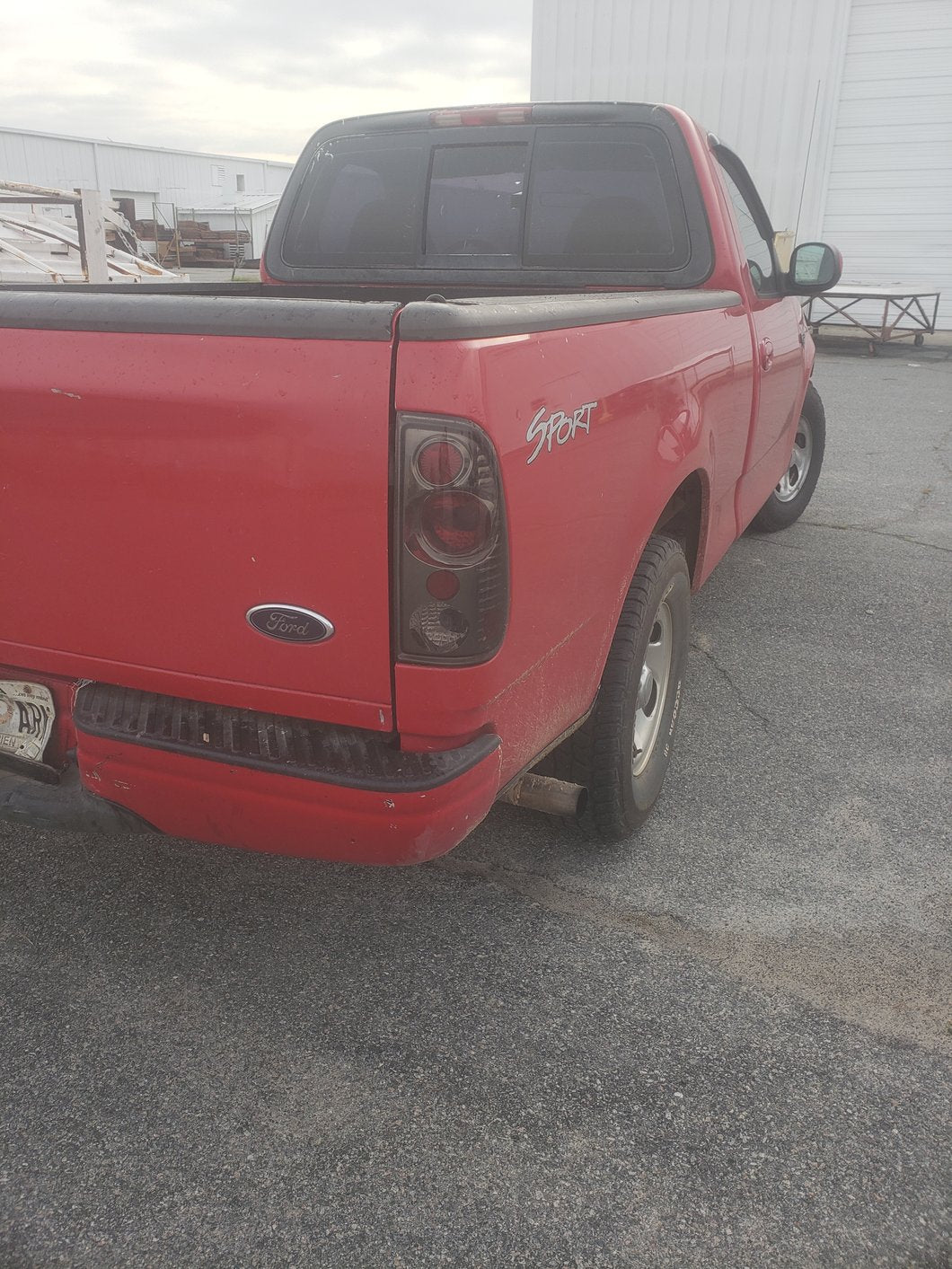 Raxiom Axial Series Version 2 Tail Lights; Black Housing; Smoked Lens (97-03 F-150 Styleside)