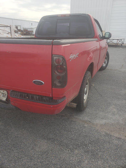 Raxiom Axial Series Version 2 Tail Lights; Black Housing; Smoked Lens (97-03 F-150 Styleside)