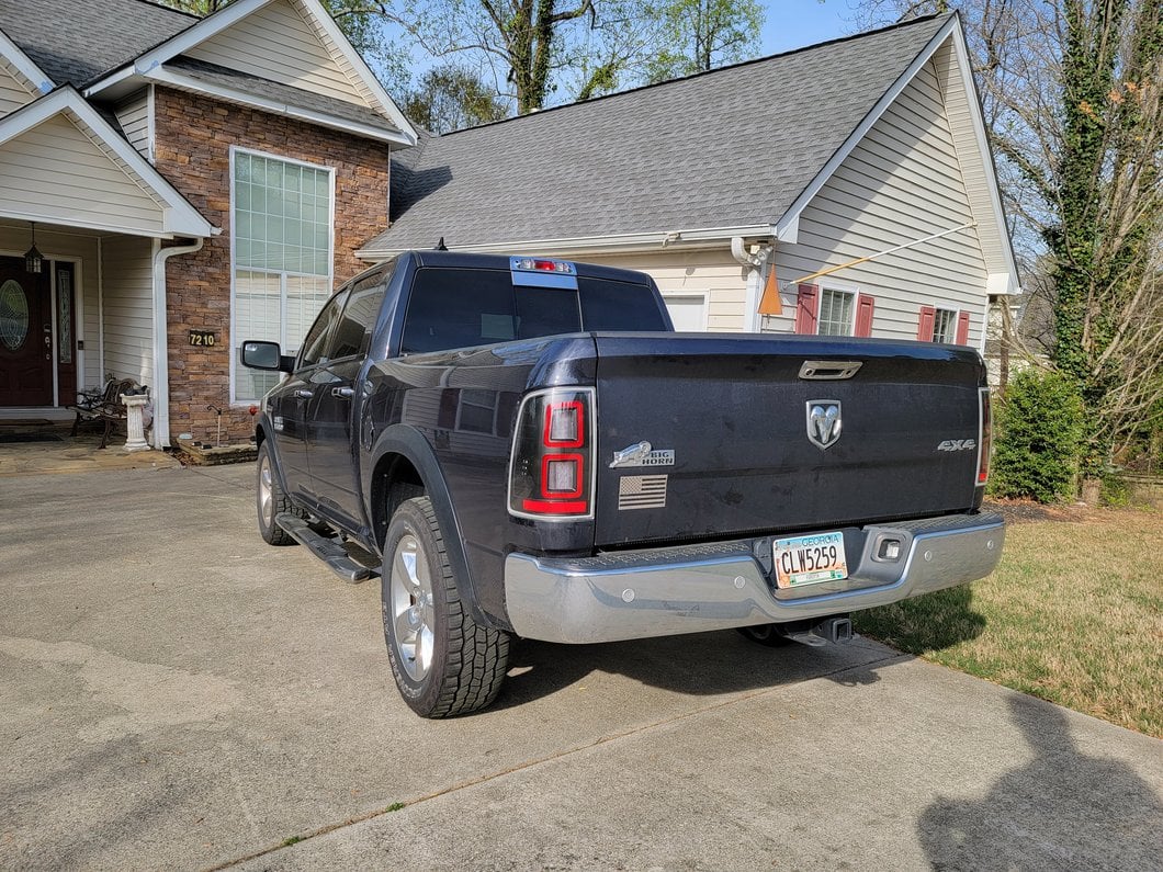Raxiom LED Tail Lights; Black Housing; Clear Lens (09-18 RAM 1500 w/ Factory Halogen Tail Lights)