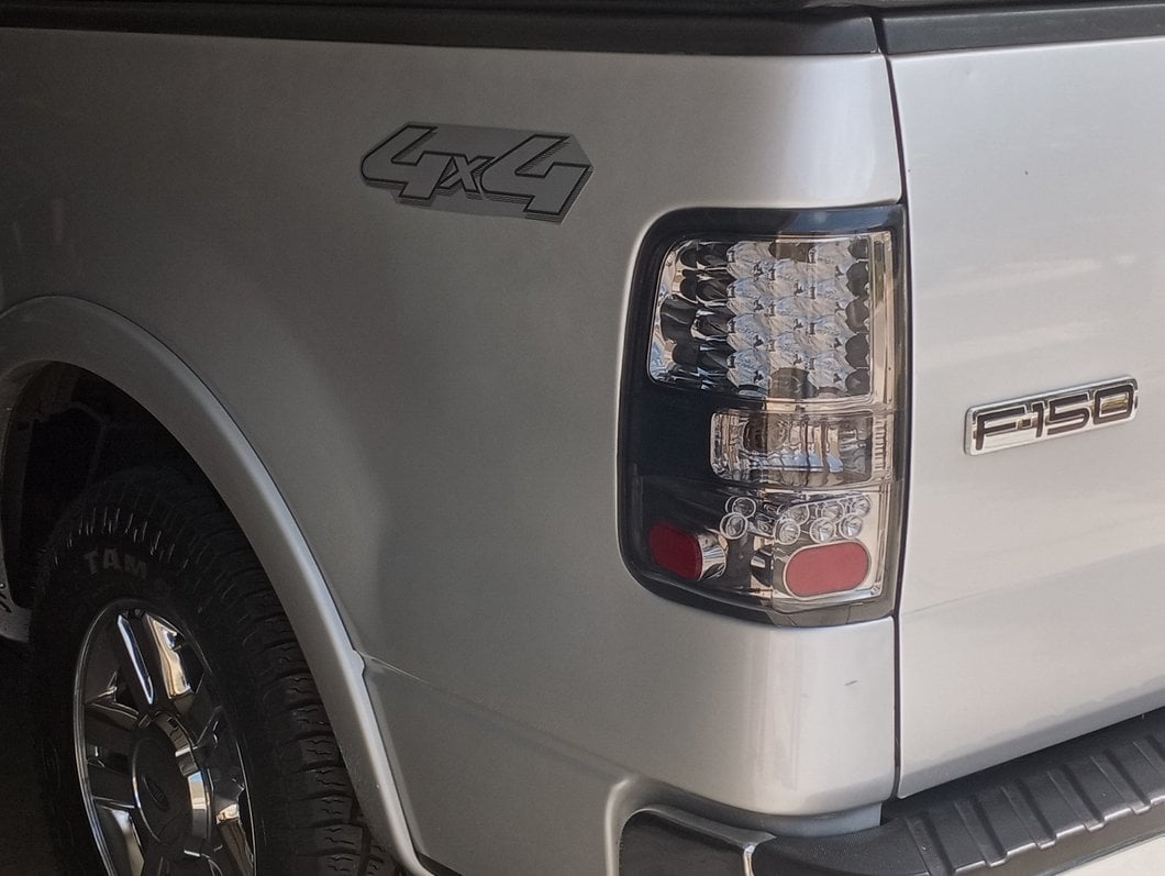 Raxiom LED Tail Lights; Chrome Housing; Smoked Lens (04-08 F-150 Styleside)