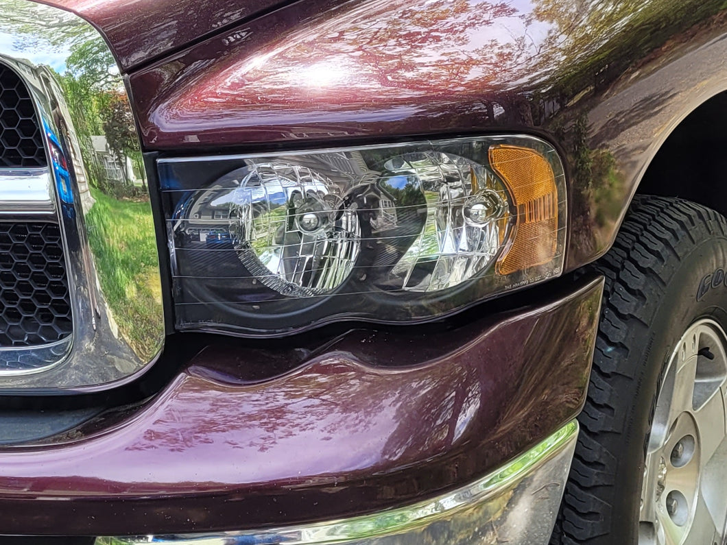 Raxiom Crystal Headlights; Black Housing; Clear Lens (02-05 RAM 1500)