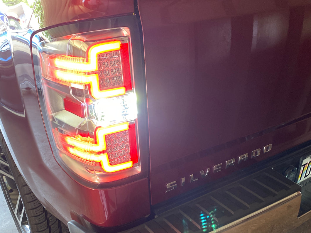Raxiom LED Tail Lights with Sequential Turn Signals; Chrome Housing; Clear Lens (14-18 Silverado 1500 w/ Factory Halogen Tail Lights)
