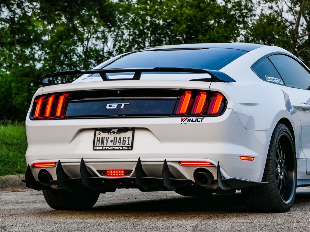 Raxiom Axial Series LED Reverse Light with Running Light and Triple Flash Brake Light; Smoked (15-17 Mustang)