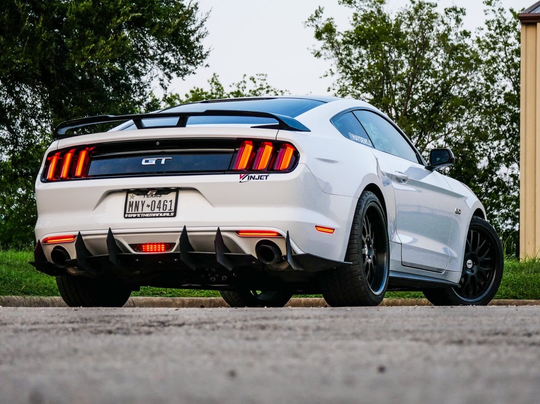 Raxiom Axial Series LED Reverse Light with Running Light and Triple Flash Brake Light; Smoked (15-17 Mustang)