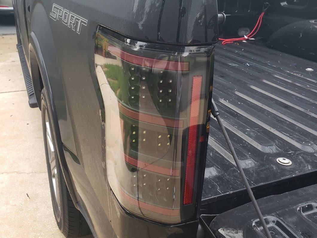 Raxiom LED Tail Lights; Black Housing; Clear Lens (18-20 F-150 w/ Factory Halogen Non-BLIS Tail Lights)