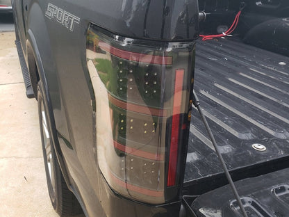 Raxiom LED Tail Lights; Black Housing; Clear Lens (18-20 F-150 w/ Factory Halogen Non-BLIS Tail Lights)