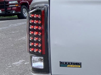 Raxiom LED Tail Lights; Black Housing; Clear Lens (07-08 RAM 1500)