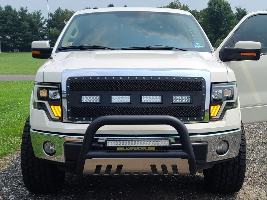 Raxiom Axial Series G4 Light Bar Switchback Projector Headlights; Black Housing; Clear Lens (09-14 F-150 w/ Factory Halogen Headlights)