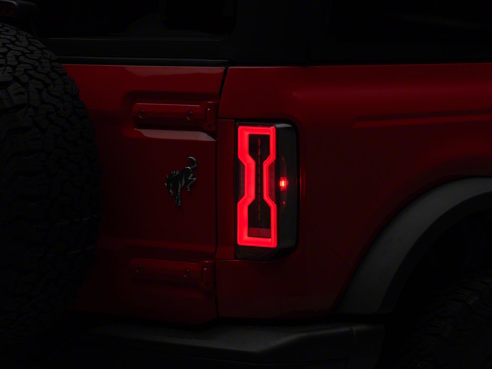 Raxiom Axial Series LED Tail Lights; Black Housing; Clear Lens (21-25 Bronco w/ Factory Halogen Tail Lights)
