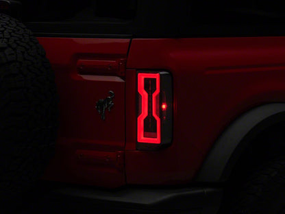 Raxiom Axial Series LED Tail Lights; Black Housing; Clear Lens (21-25 Bronco w/ Factory Halogen Tail Lights)